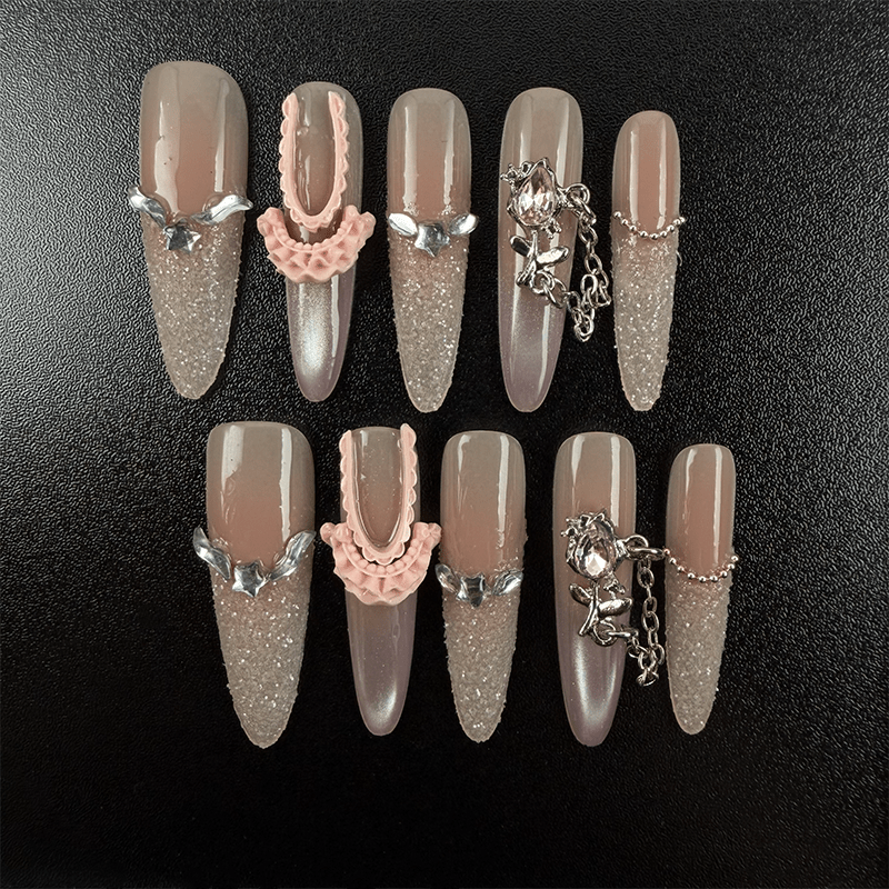 49 - Noah-Nude glitter almond press on nails with pink bow and silver butterfly details