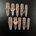 49 - Noah-Nude glitter almond press on nails with pink bow and silver butterfly details