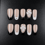 Black and white floral press-on nails with 3D white flowers