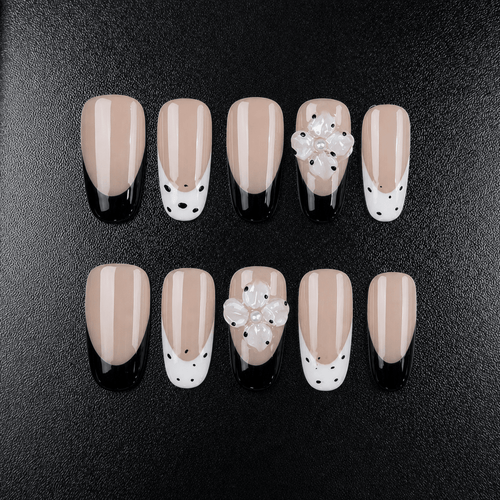 Black and white floral press-on nails with 3D white flowers