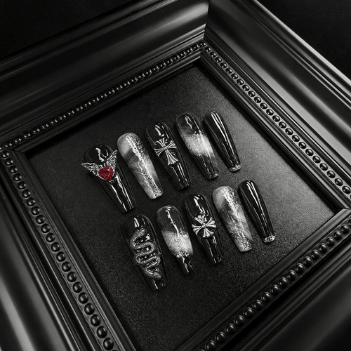 Black gothic press-on nail set with smoky translucent accentsa