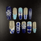 Blue and white porcelain floral press-on nails in long coffin shape