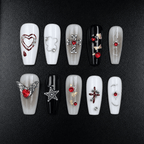 Gothic press-on nails in black, white, gray, and red