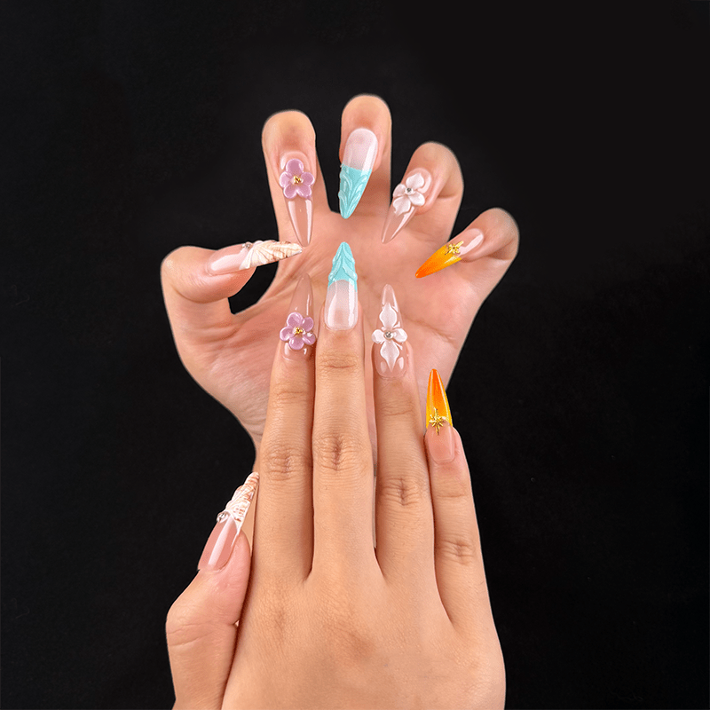 Long almond mint green seashell press-on nails on hand