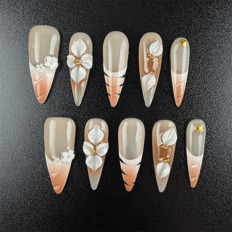 Nude gradient stiletto press-on nails with 3D white flowers