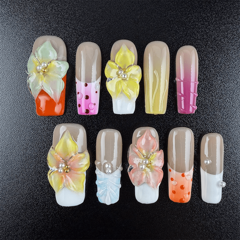 Square french tip press on nails with green 3D flowers and pink orange tips